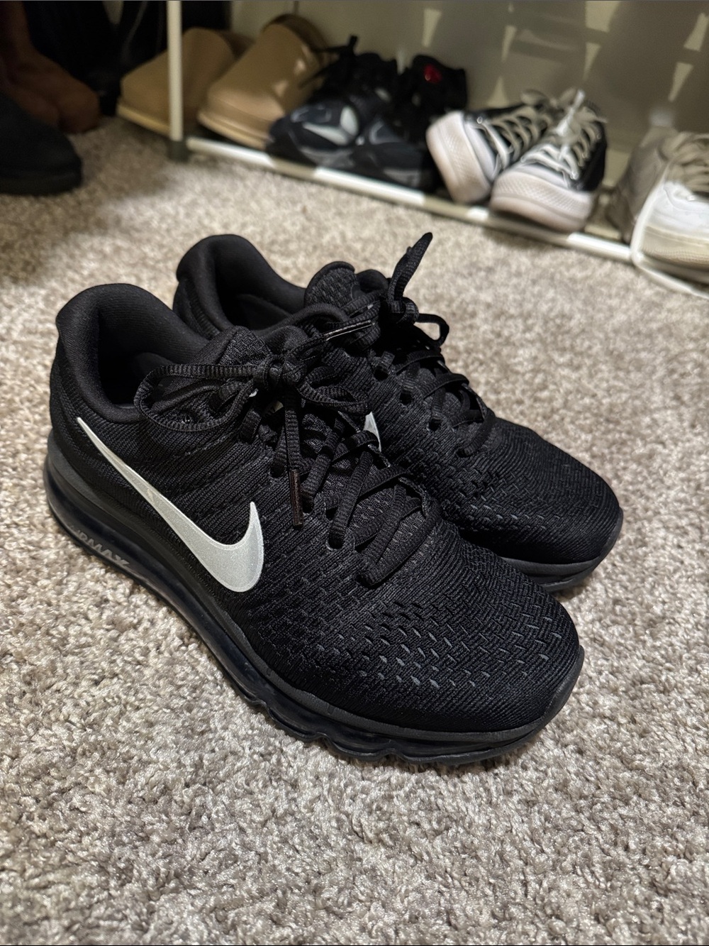 Nike Black Sneakers with White Swoosh Air Cushion